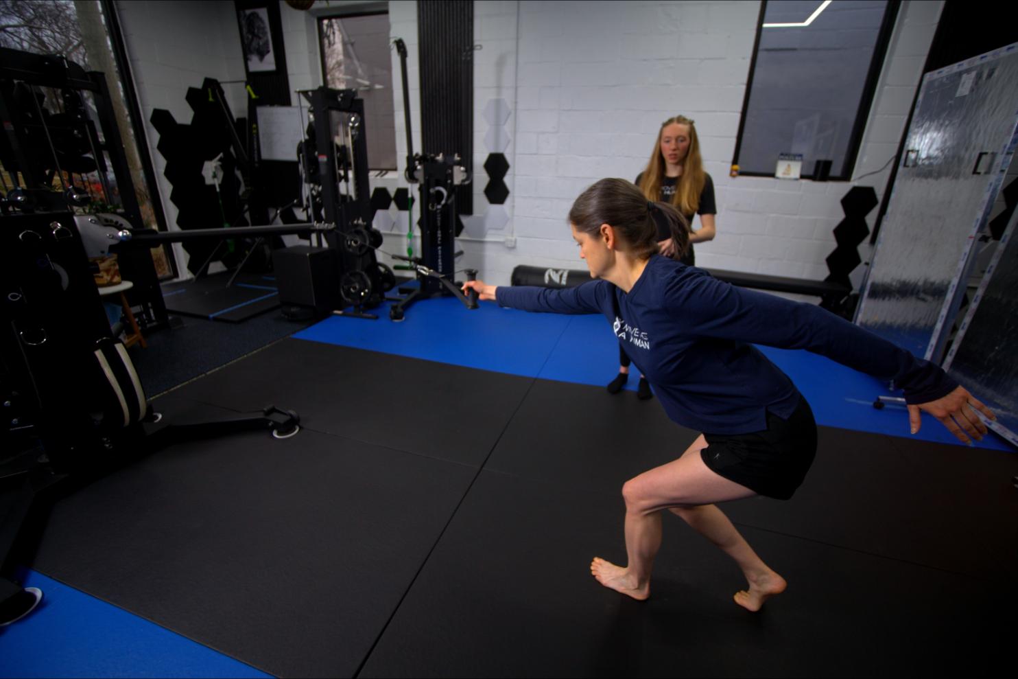Owner working with client at Move As A Human